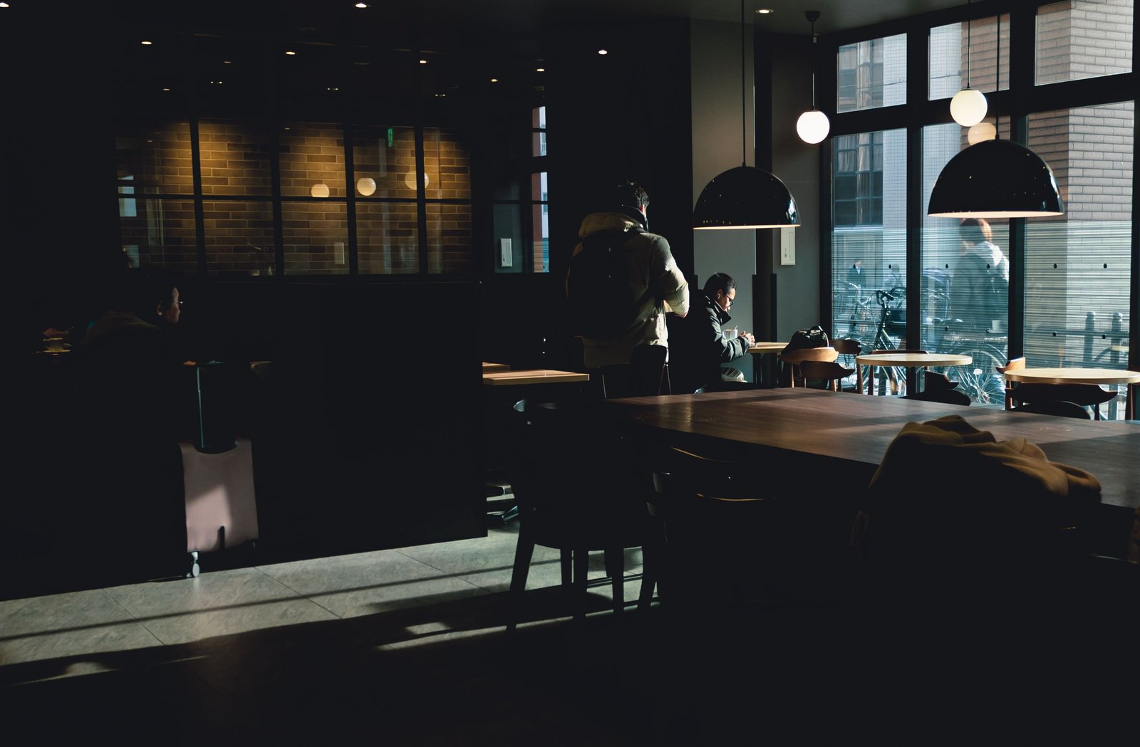 Warm evening light inside a busy bistro
